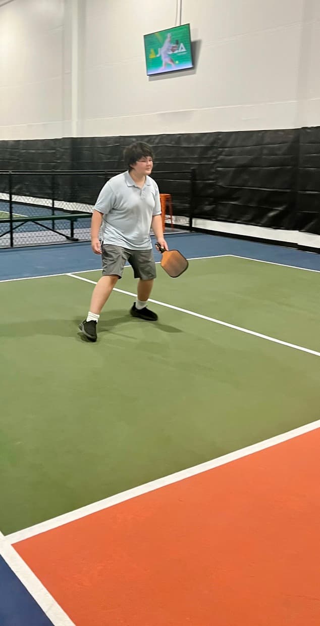 Young player at a Next Gen Academy pickleball session